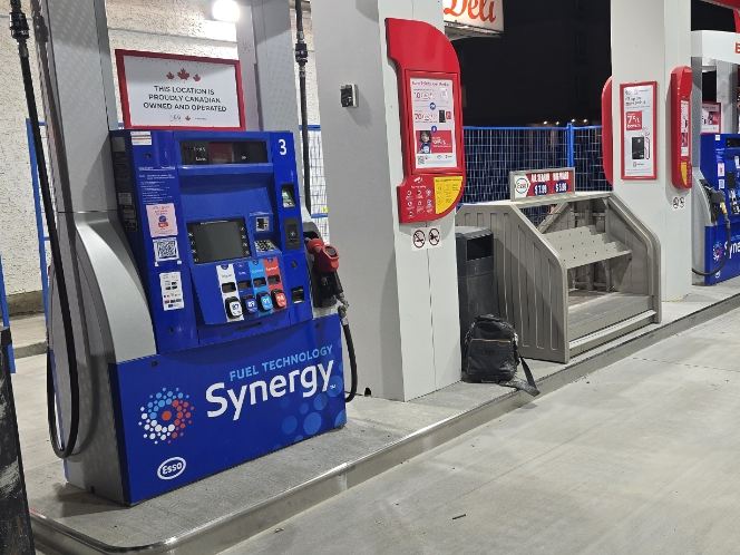 Close-up of an Esso Synergy fuel dispenser at the Nisku station