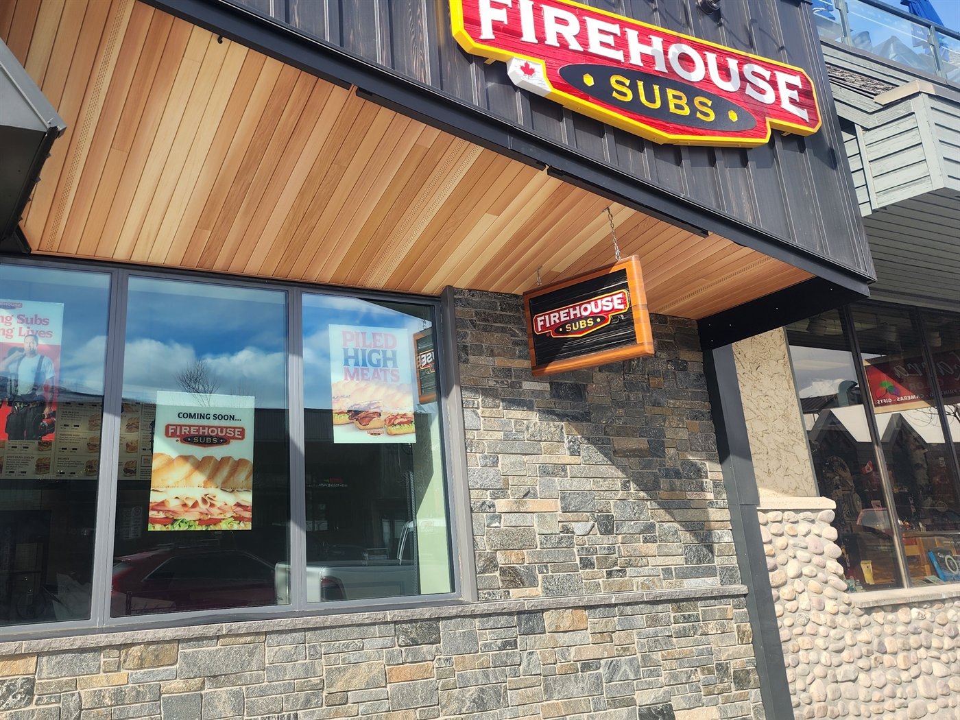 Firehouse Subs storefront in Jasper, Alberta with the red and yellow sign
