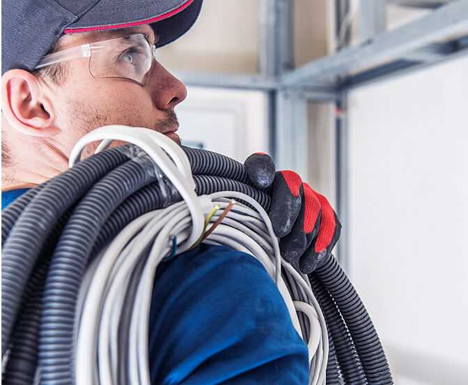 Maax Electrical technician on a commercial job site